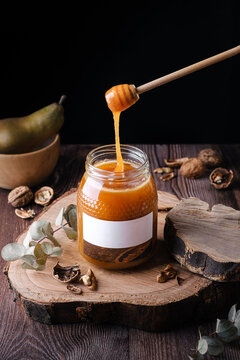 Jar and spoon with honey