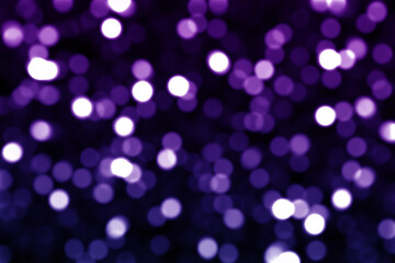Bluish purple bokeh wallpaper on black background