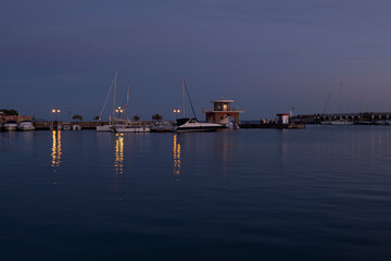 Fototapeta premium Sunsets in Cilento, Italy. Fiery horizons at sunset. wave motion.