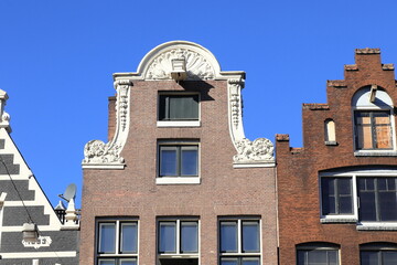 Historic House Gable Close Up in Nieuwezijds Voorburgwal Street in Amsterdam, Netherlands