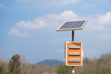 Mini solar cell panel installed outdoor. Blue sky background. Concept : using green and clean...