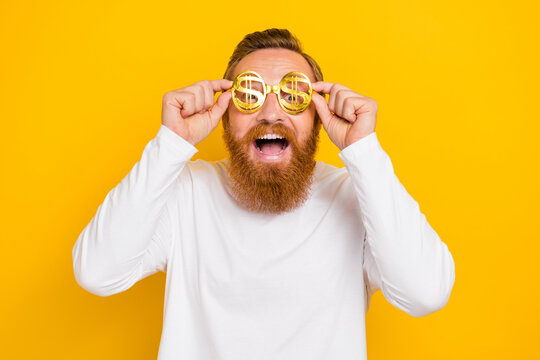 Photo of hooray beard orange hair man wear eyewear white shirt isolated on yellow color background