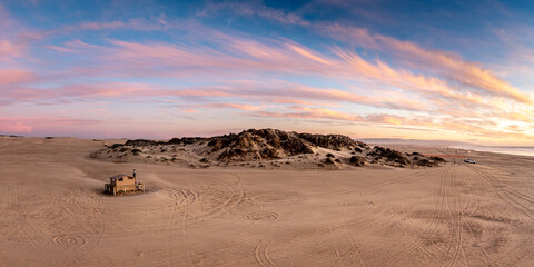 Sand Oceano Dunes Pismo Beach California beach hut panorama aerial image.