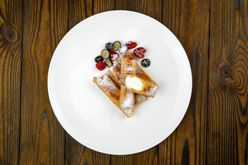 delicious sweet pancakes on a plate.
