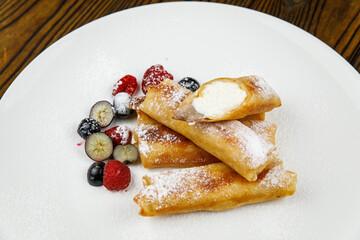 delicious sweet pancakes on a plate.

