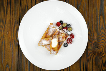 delicious sweet pancakes on a plate.
