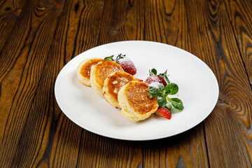 delicious sweet pancakes on a plate.
