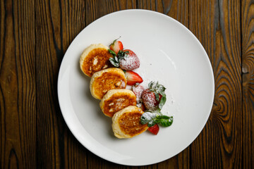 delicious sweet pancakes on a plate.
