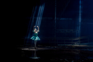 A young ballerina with a perfect body is dancing in a photo studio, dancers are dressed in fashionable outfits, this picture is taken in minimal style, showing the beauty of classical art like ballet.