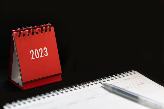 2023 Red Calendar with monthly planner diary on black background, schedule. Office business calendar booking for meeting, event, agenda