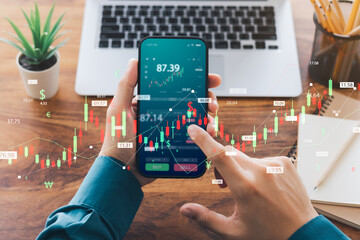 Businessmen work with stock market investments using smartphones to analyze trading data. smartphone with stock exchange graph on screen. Financial stock market.