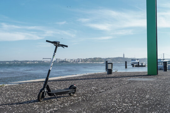 Electric scooter in Passeio mar&iacute;timo da Doca da Marinha, Lisboa, Portugal