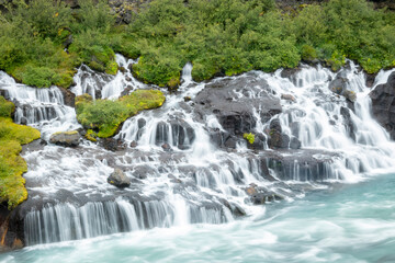 Hraunfossar, or "Lava Falls", is a series of small waterfalls located in west Iceland