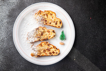 stollen sweet christmas pie pastries dried fruits, marzipan, nut delicious snack meal food snack on the table copy space food background 