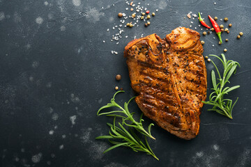 Raw steak t-bone or porterhouse. Steak t-bone or porterhouse in sauce with spices, salt and...
