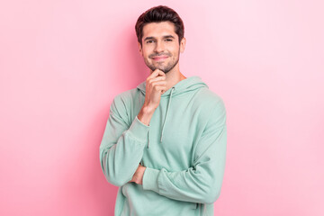 Fototapeta premium Photo of positive cheerful guy touch chin minded thinking about solution his problem genius idea wear khaki sweater isolated on pink color background