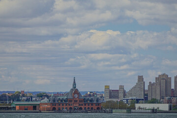Fototapeta premium Liberty State Park, Jersey City, NJ: The Central Railroad of New Jersey Terminal (1889) (left); Empty Sky, the 9/11 memorial (right).