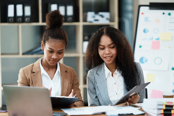 Woman using a laptop at a office