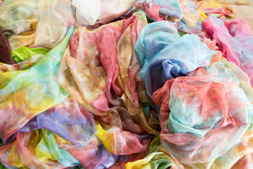 Background of multi-colored silk scarves