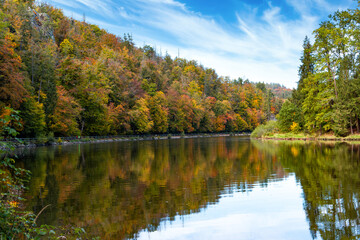 Road along the Vltava river in the autumn season.