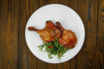 baked meat, grilled chicken on a wooden table
