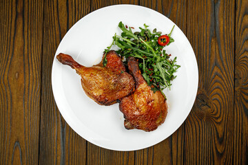 baked meat, grilled chicken on a wooden table
