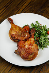 baked meat, grilled chicken on a wooden table
