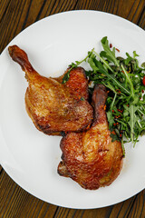baked meat, grilled chicken on a wooden table
