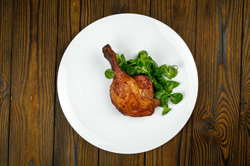 baked meat, grilled chicken on a wooden table
