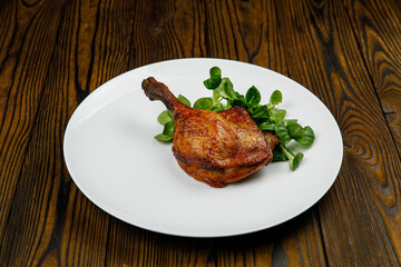 baked meat, grilled chicken on a wooden table
