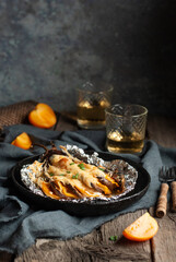 Homemade roasted eggplant with onion, tomatoes, potato, herbs and cheese. Close up