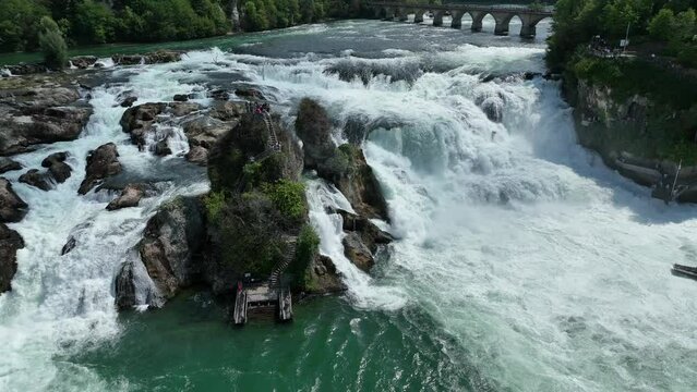 Rhine Falls waterfall in Schaffhausen, Switzerland seen from above. The Rheinfall in the river Rhine is the most powerful waterfall in Europe.