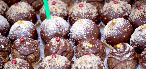 Homemade chocolate balls  with sprinkles .