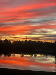 Obraz premium sunset over the river