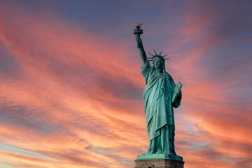 Statue of Liberty , New York , Usa. Cloudy winter day. sunset time