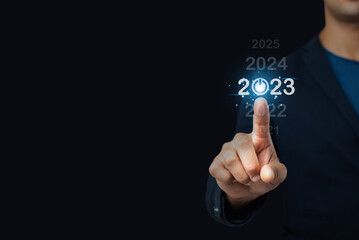 In 2023, pointing at a computerized user interface, Up until 2023, there are plans to speed up...