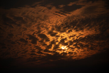 Sunlight at sunset and shadows of clouds