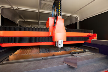 CNC lathe milling machine precisely cutting a piece of metal in a pre-designed shape