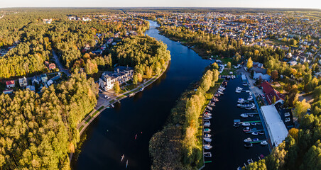 Top view of the Augustow Canal and Lake Necko on an autumn day at sunset.