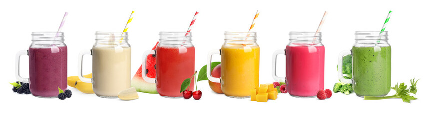 Set with different delicious smoothies in mason jars on white background. Banner design