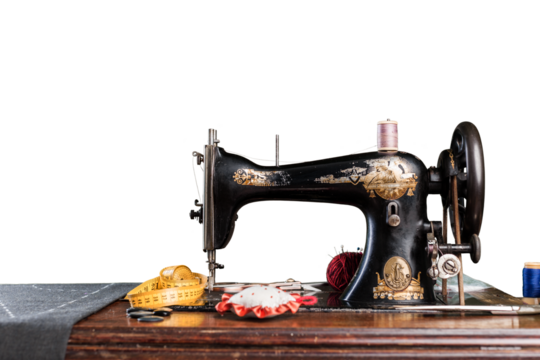 The old sewing machine on a white background