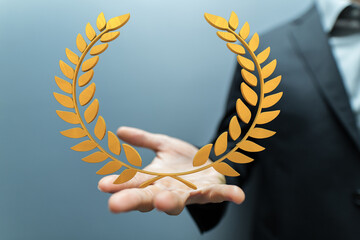 winner honer prize in hand