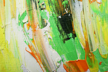 Beautiful strokes of colorful oil paints as background, closeup