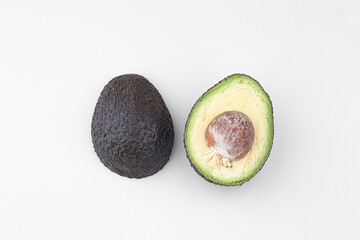 avocado with bone cut on a white background