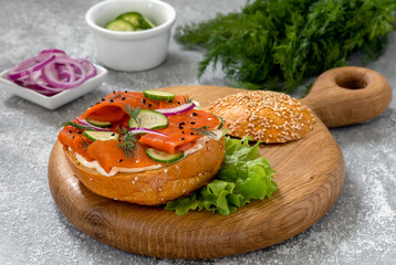 Vegan Carrot Lox served on bread bun with cream cheese, cucumber slices, red onion and dill. Tasty...