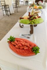 Catered Fruit Buffet with Watermelon, Grapes, Mellon, and Cheese