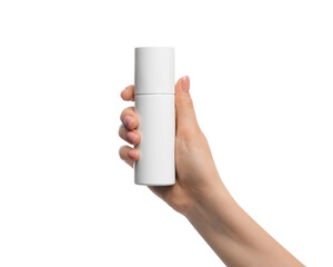 Aerosol container in a female hand on a white background