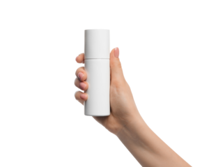 Aerosol container in a female hand on a white background