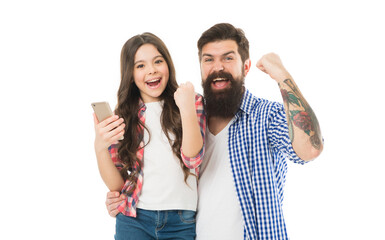 User experience. Father and daughter set up smartphone. Modern technology. Little girl with father. Small child and dad explore smartphone. Download application for smartphone. Guide for adults