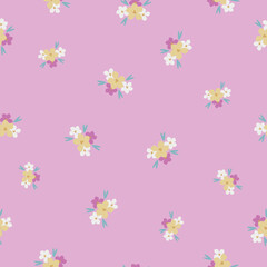 seamless vintage pattern. small colored flowers. pink background. vector texture. fashionable print for textiles and wallpaper.